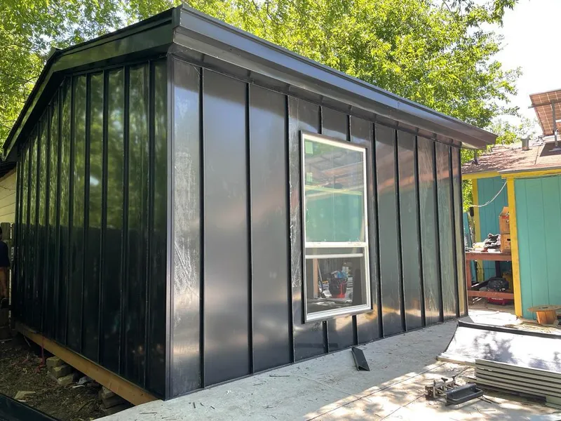 Black standing seam metal wall panels for Roof Inspection in Terrytown